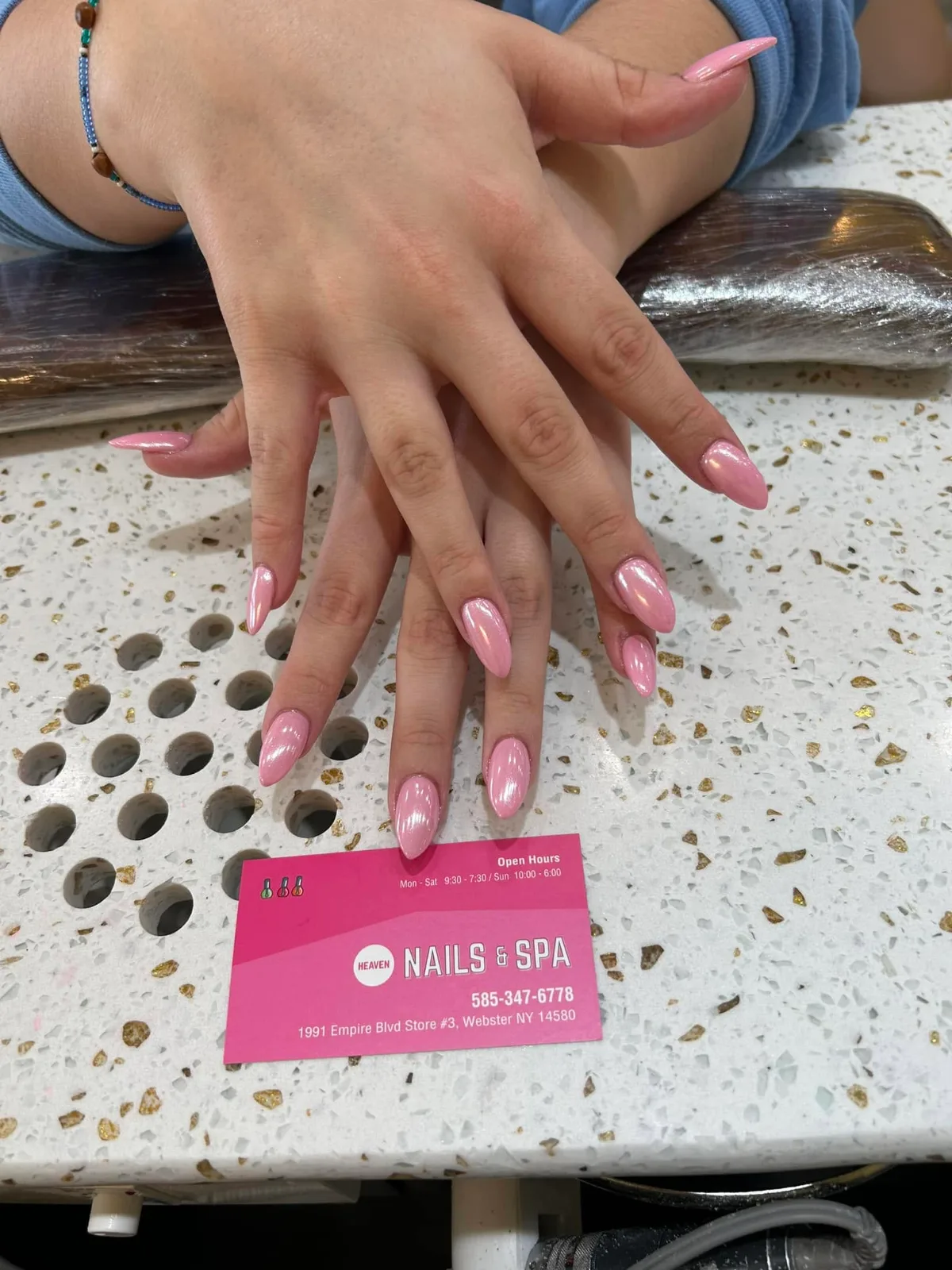 Pink chrome on long almond nails